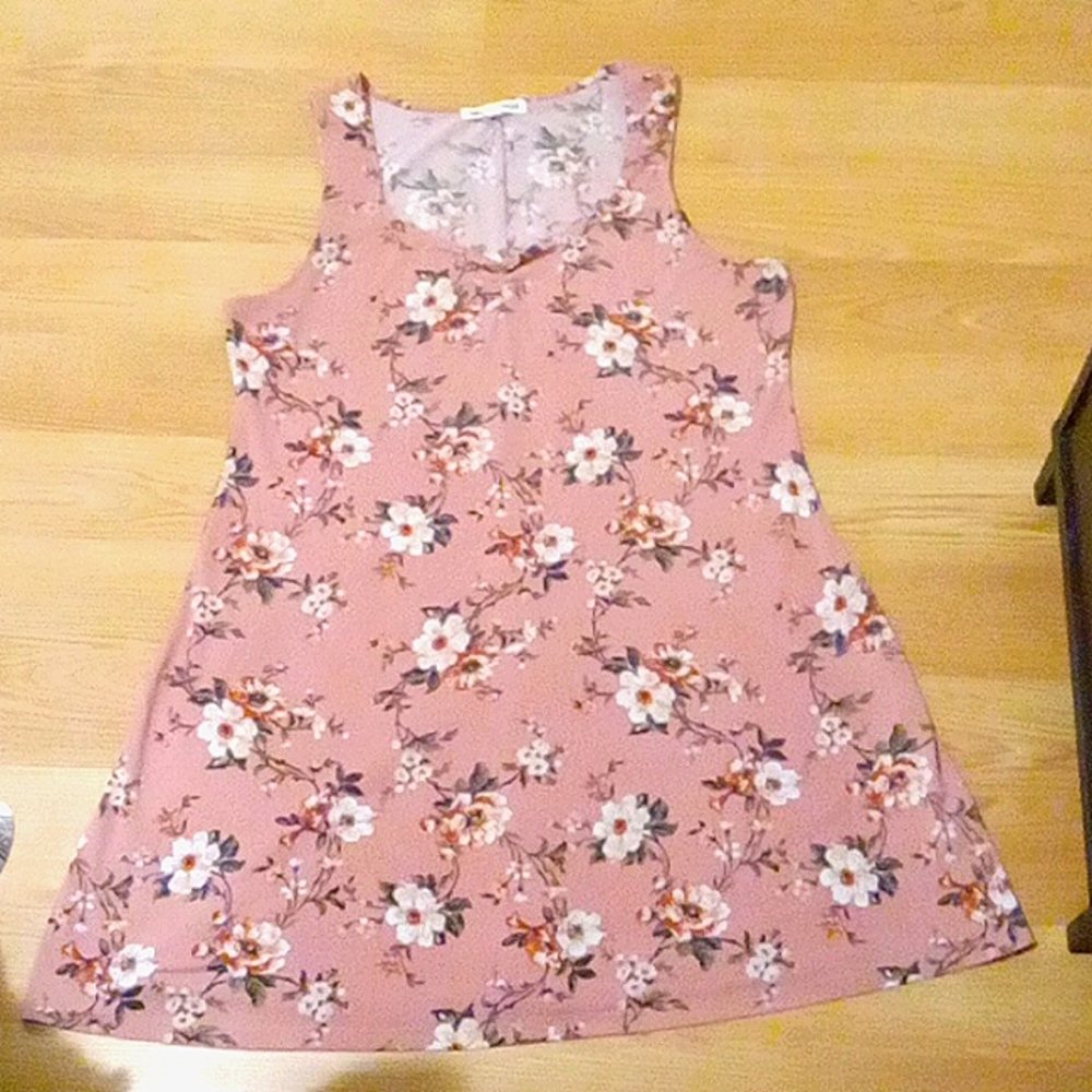 The flower make the dress more for spring .